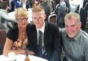 Ben Stokes, centre, pictured with mum Deb and his late father Ged