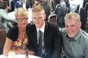 Ben Stokes, centre, pictured with mum Deb and his late father Ged