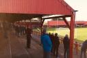 A socially distanced crowd at Workington Reds v Mossley, which features in Daniel Gray's book The Silence of the Stands