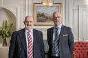 Nicholson Portnell Senior Partner Richard Nelson with Cartmell Shepherd Solicitors Managing Director Peter Stafford.