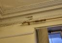 Plaster is again coming off the Maryport council chamber walls despite a £200,000 refurbishment of the town hall