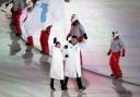 Chung Gum Wang and Yunjong Won lead out North Korean and South Korean athletes during the Opening Ceremony of the PyeongChang 2018 Winter Olympic