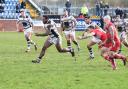 IN THE CLEAR: Haven’s Dion Aiye makes a break against Doncaster