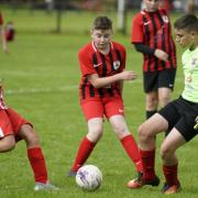 Maryport Amateurs U13 tackle Moor Row Reds             Pictures: David Tuck