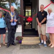 Golf team holds grand reopening of clubhouse