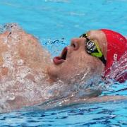 Luke Greenbank, of Britain, swims in a heat of the men's 200-meter backstroke at the 2020 Summer Olympics, Wednesday, July 28, 2021, in Tokyo, Japan. (AP Photo/Petr David Josek).