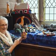 Rose Lewis with her knitted Noah's Ark