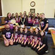 Maryport Mayor Linda Radcliffe with the town's world champion cheerleaders