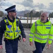 Deputy police, fire and crime commissioner, Mike Johnson with Keswick’s community beat officer,