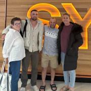 Zarrin with his family as he leaves Sydney airport for Workington