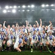 Glory: England’s women’s side, including Cumbrians Abbie Scott, front row third right, and Cath O’Donnell, back row sixth right, completed the Six Nations Grand Slam