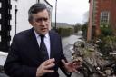 Britain's Prime Minister Gordon Brown speaks to media in Cockermouth, Cumbria, where he inspected flood-hit areas and visited residents.  PRESS ASSOCIATION Photo. Picture date: Saturday November 21, 2009. Mr Brown today pledged an extra £1