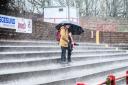 William Baker and grandson Dylan brave the elements on the Borough Park terraces. Picture: Gary McKeating