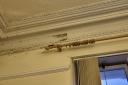 Plaster is again coming off the Maryport council chamber walls despite a £200,000 refurbishment of the town hall