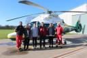 GNAAS paramedic Lee Salmon and Dr Lyle Moncur with Ian Wood and his family