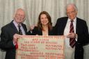 Former Labour MPs for Workington Sir Tony Cunningham, Baroness Sue Hayman and Lord Dale Campbell-Savours, with a banner embroidered by Workington Labour Party member nonagenarian JMercia Haughan.