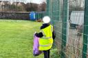 Youths clearing up litter