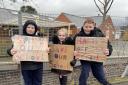 Daryl, Kaci, James protested against proposals to close Treowen Primary School in January this year.