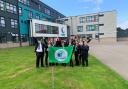 The Eco-Committee with their newly awarded Green Flag
