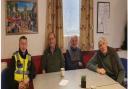 Police officers meet with elderly people