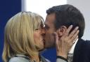 Passionate: French centrist presidential candidate Emmanuel Macron kisses his wife Brigitte