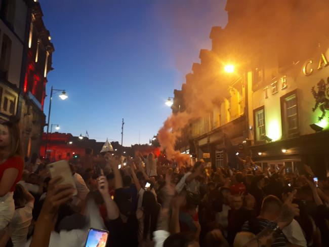 CELEBRATION: Crowds gather on Botchergate in Carlisle city centre after Engand beat Denmark 2-1 in the Euro 2020 semi final 