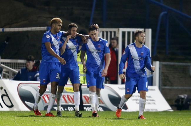 Former Hartlepool United striker Scott Fenwick, second right, has joined Workington Reds (photo: PA)