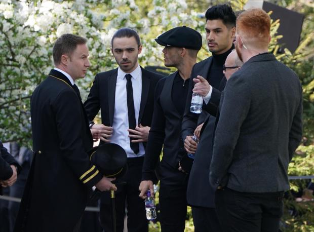Times and Star: The members of The Wanted (left to right) Max George, Jay McGuiness, Siva Kaneswaran and Nathan Sykes (partially hidden) arrive for the funeral of The Wanted star Tom Parker. (PA)