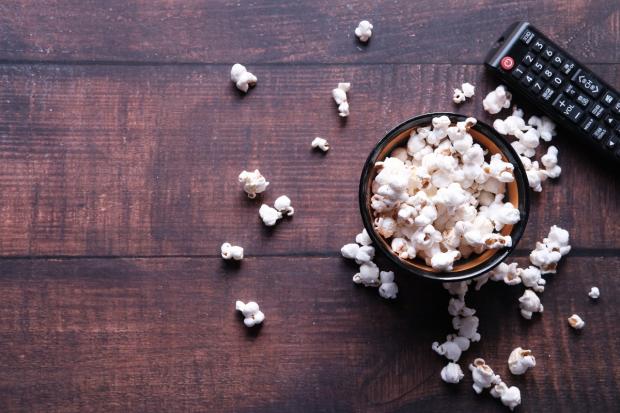Times and Star: A bowl of popcorn and a TV remote (Canva)