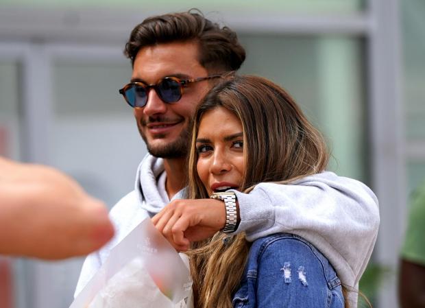 Times and Star: Love Island winners Davide Sanclimenti and Ekin-Su Culculoglu arrive at Stansted Airport in Essex. (PA)