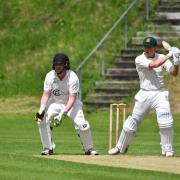 Marc Brown: Carlisle's skipper, right, was happy to see his batsmen get a knock against Millom