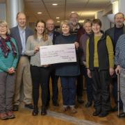 FUNDING: Friends of Theatre by the Lake handing over the final cheque