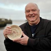 SAUCERE:  Cliff Ismay with a Titanic saucer found by a fisherman off the coast of Holyhead