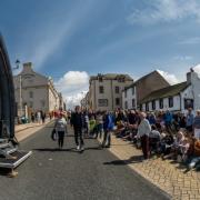 Crowds line Shipping Brow for sea shanties