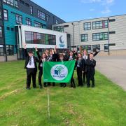 The Eco-Committee with their newly awarded Green Flag