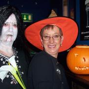 Committee member Lorraine Chester, of High Harrington, and Macmillan Cancer Relief West Cumbria co-ordinator Barbara Sharp get in the spirit of things to celebrate Halloween at a special family disco in Monroe's Bar, Workington, in 2022