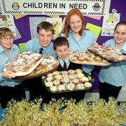 Cockermouth School year nine pupils, from left, Debbie Briggs, David Magee, Robb Carter, Amy Harrington and Emma Barker, with their Children In Need cakes