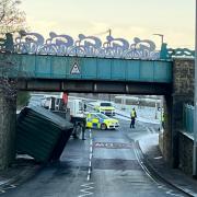 The lorry collided with the bridge at Seaton and its containers fell off