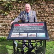 Maaryport Mayor Peter Kendall  unveiled a plaque o those who died in the Broughton armament dump  explosion during World War II