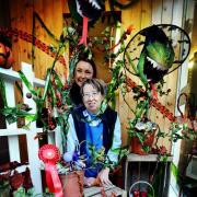 Jill Skinner, front, and staff membber Dawn Greenwood with their prizewinning  Little Shop of Horrors window,