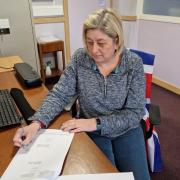Workington Mayor Denise Rollo signing the transfer documents to purchase the Ranch