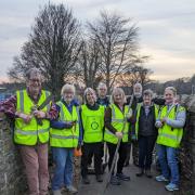 Cockermouth Rotary Club's clean team at work on the popular footpath