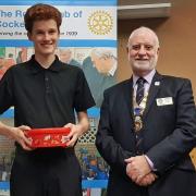 Winner of the Young Musician was pianist Jason Mooney, pictured with Rotary president Andy Carter