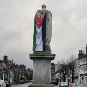 The Palestinian flag which was placed on the town's Mayo statue