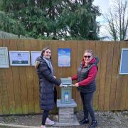 Bridie Marr and Lisa Mackereth with the Letters to Heaven post box.