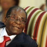 Guests at town's festival include the man Robert Mugabe called a spy